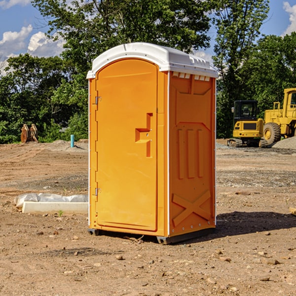 how often are the portable restrooms cleaned and serviced during a rental period in Milroy